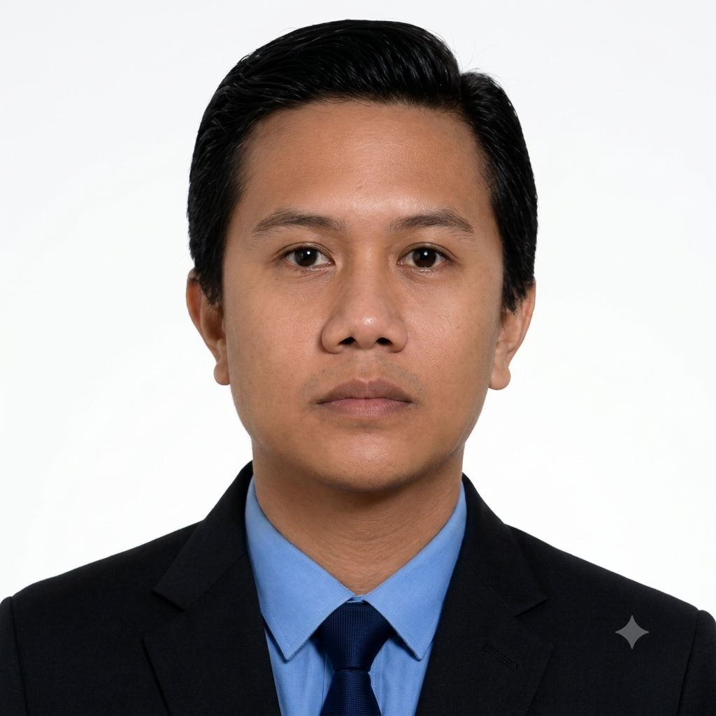 Professional headshot of Greg Ian Flores